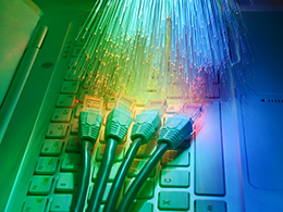 network cable closeup with fiber optical background